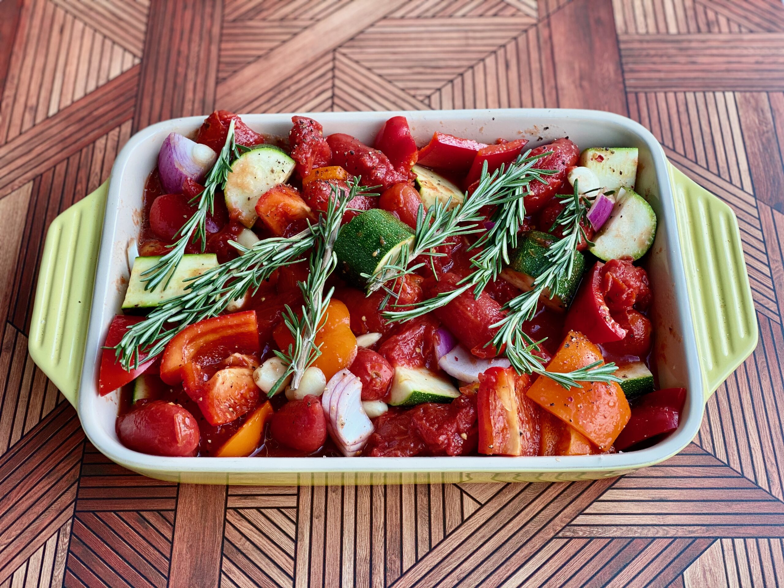 Easy Roasted Tomato Vegetable Soup An image of a pan full of vegetables