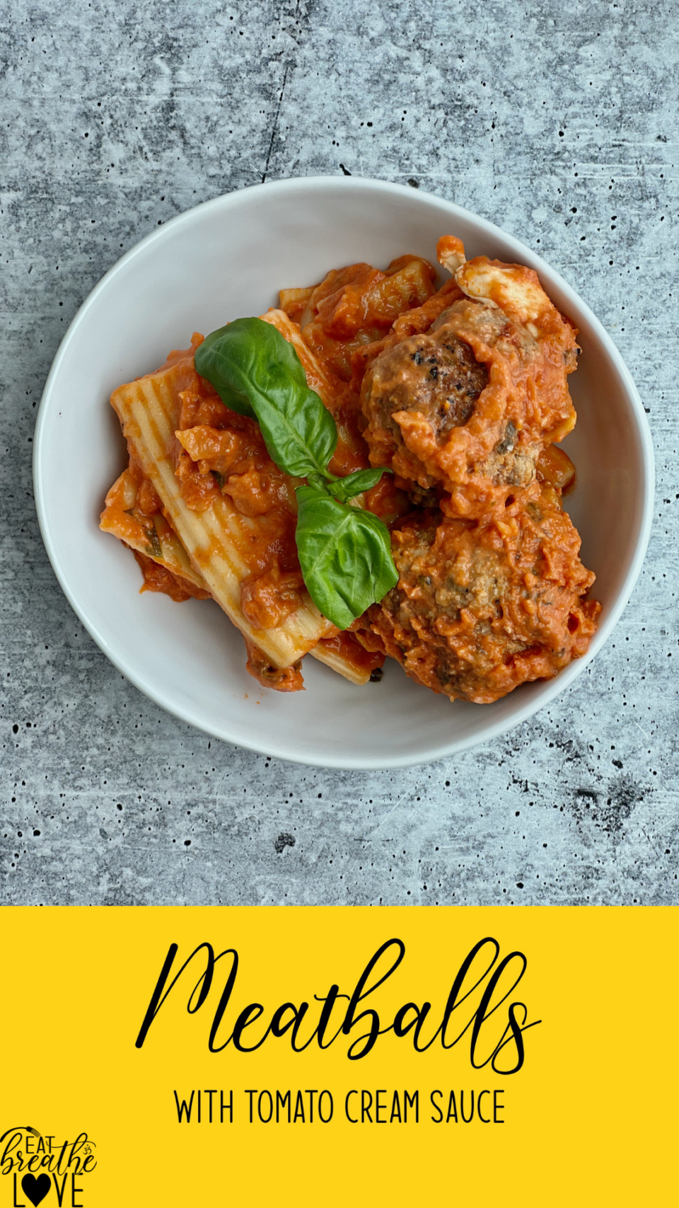 Meatballs with Tomato Cream Sauce A bowl of pasta and meatballs