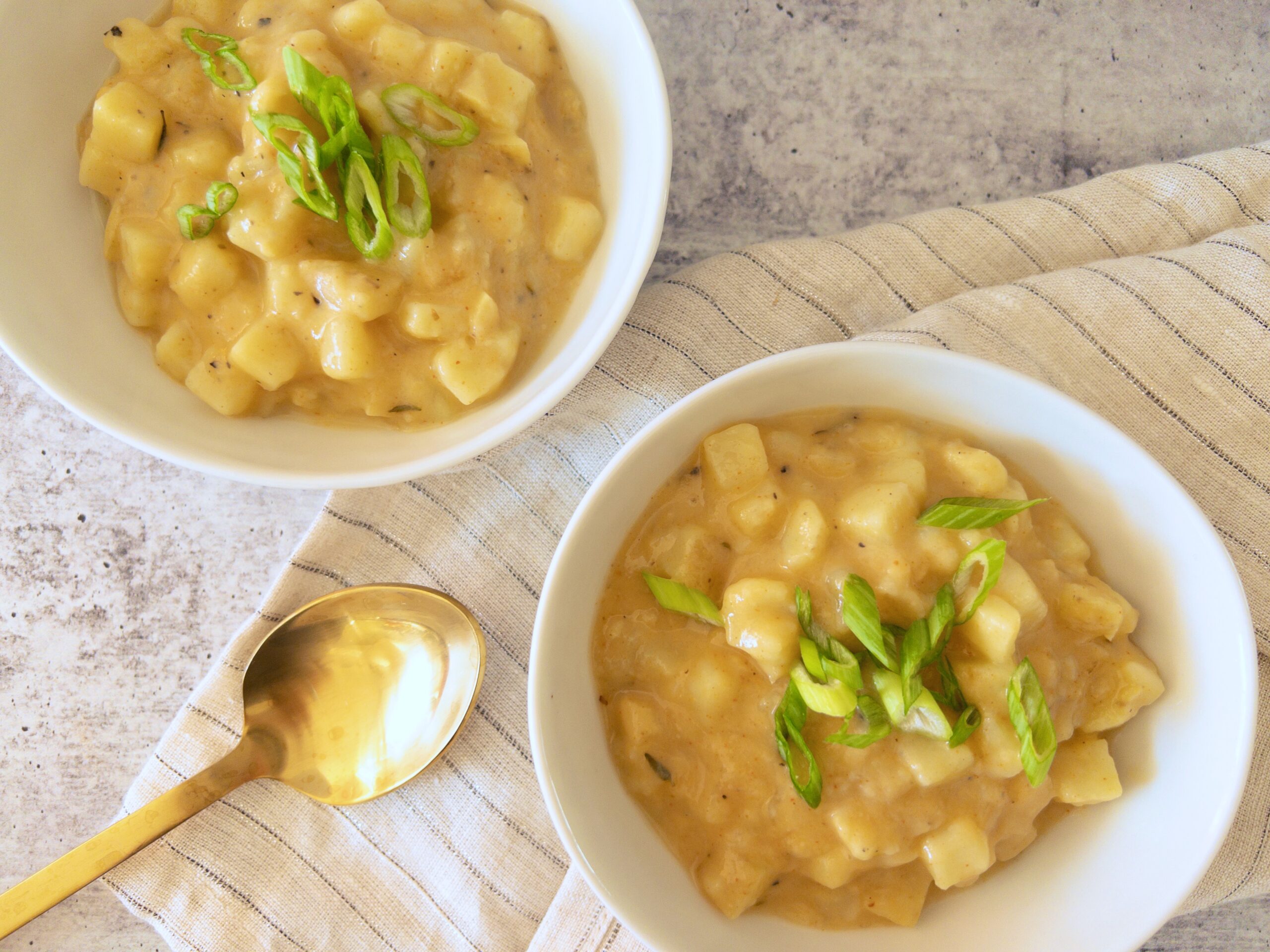 Copycat Outback Potato Soup Recipe Picture of two bowls of potato soup